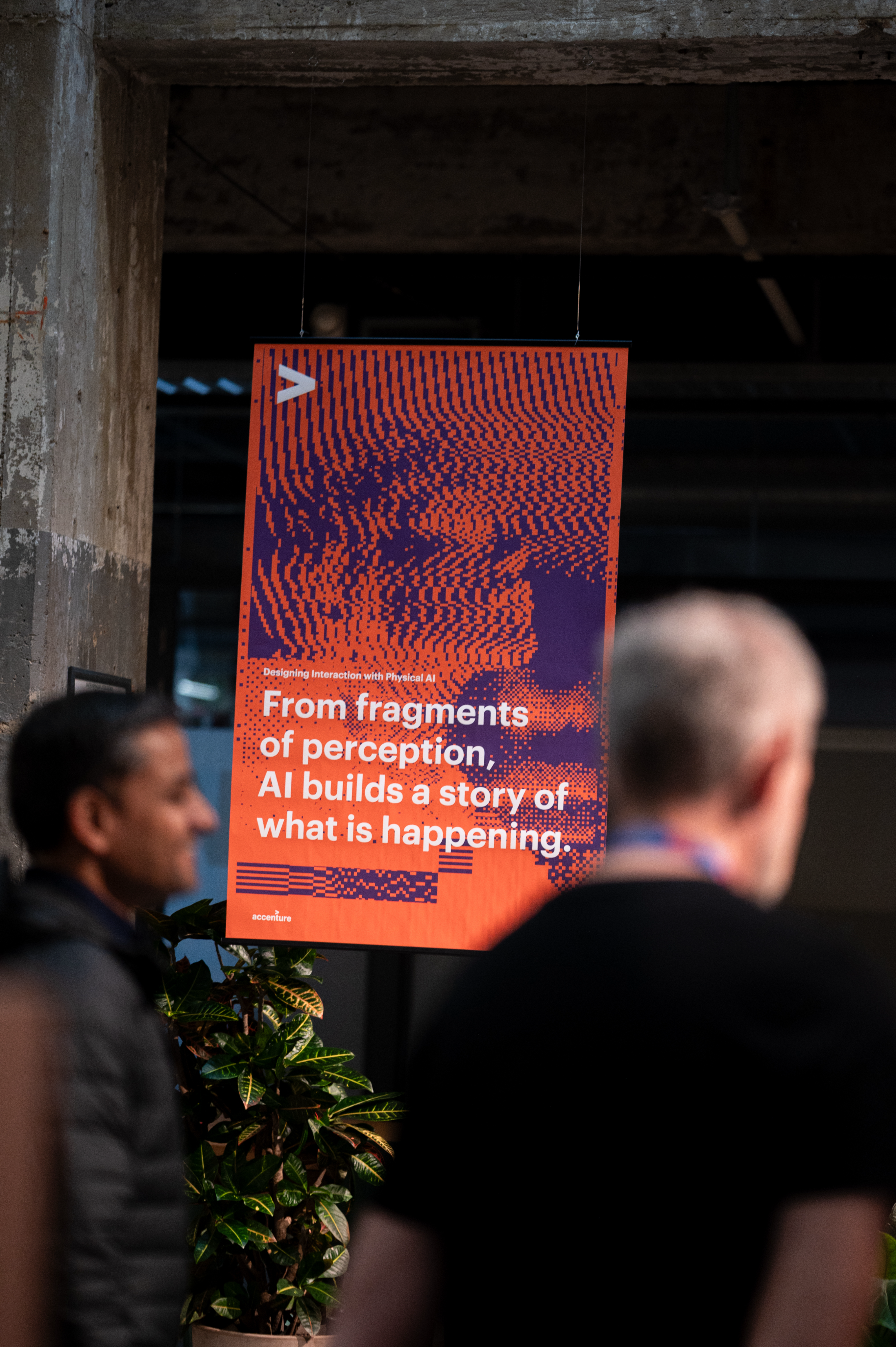 Orange exhibition poster in the Dutch Design Week gallery
