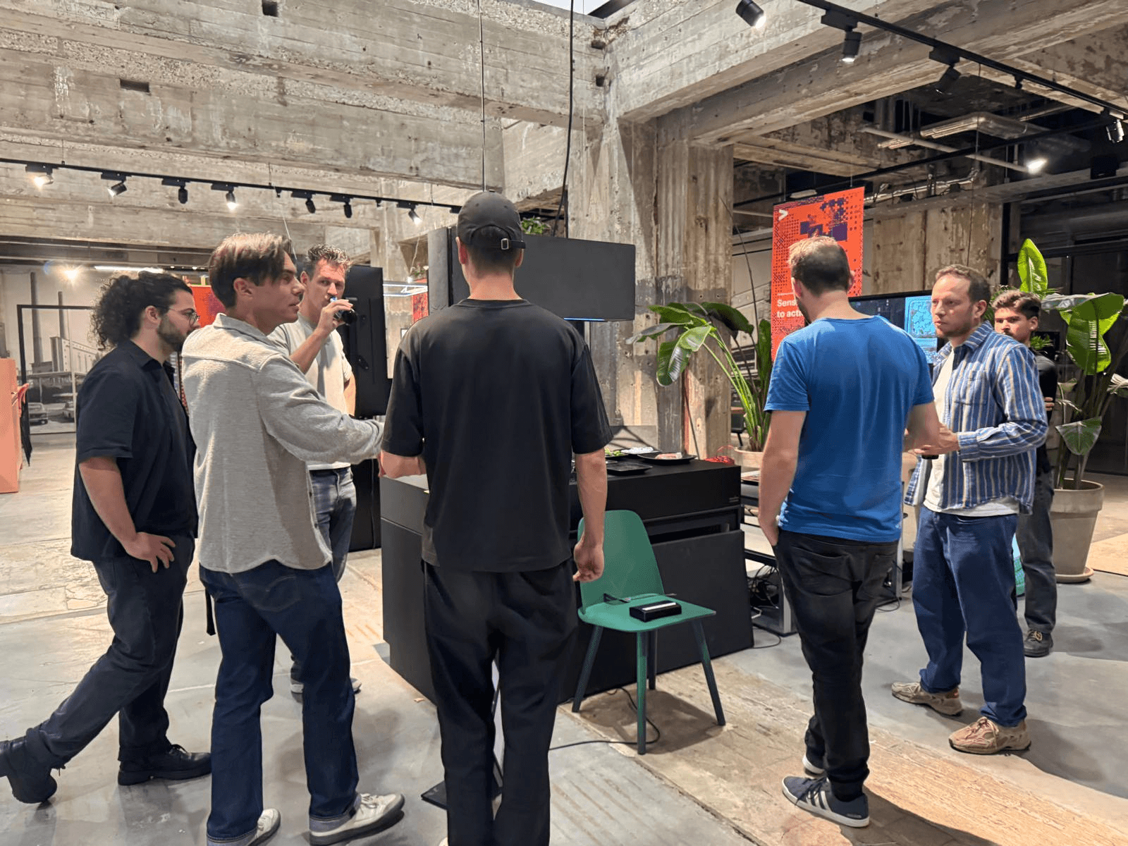 Visitors gathered around the Smart Kitchen exhibition setup